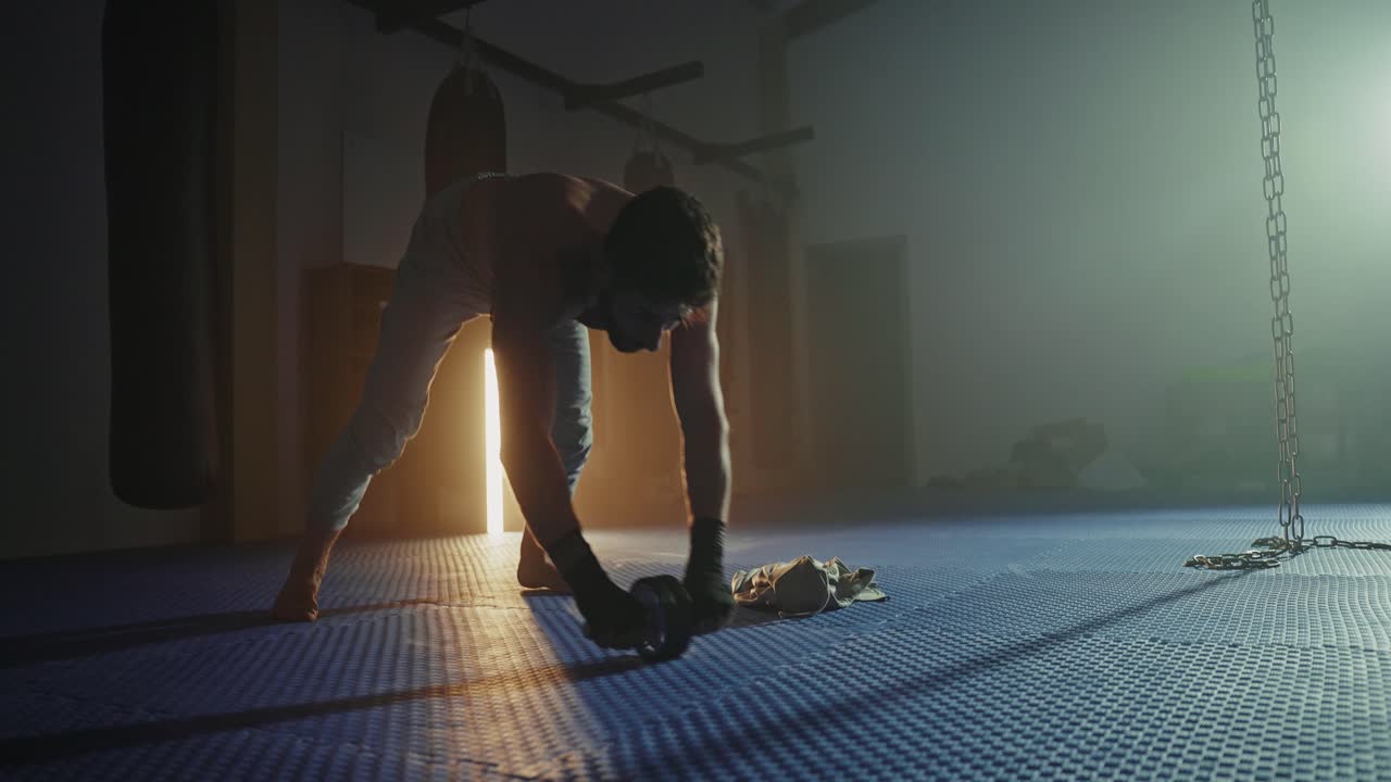 Man warming up before martial arts training session