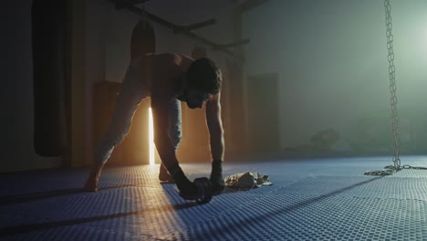 man warming up before martial arts training session