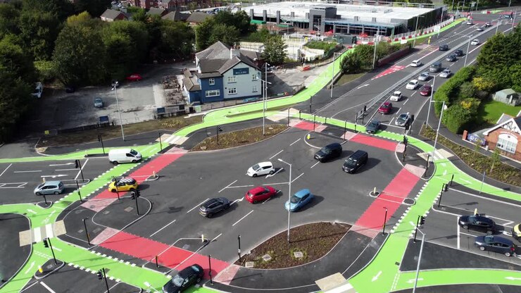 Aerial view following direction vehicles travelling St Helens CYCLOPS traffic optimisation junction crossroad intersection