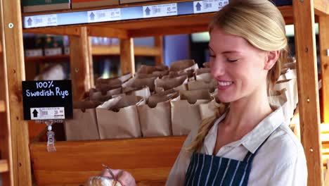 female staff holding parcel