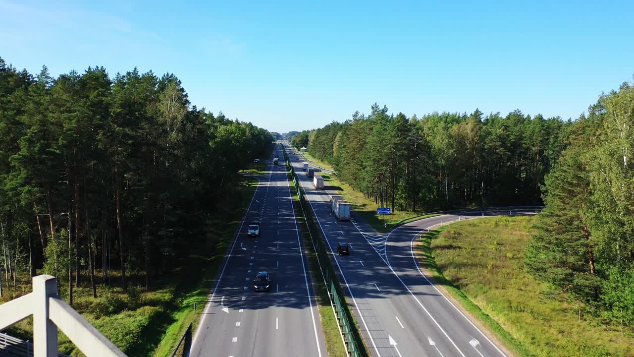 Wide drone panorama reveals road traffic, Riga showing transport system, Latvia