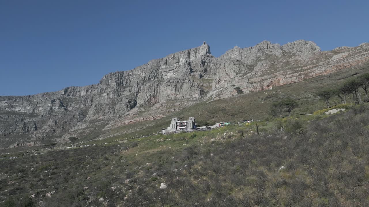Rising drone shot of Table Mountain in South Africa.
