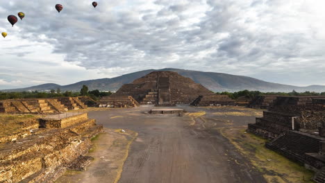 drone shot toward the pyramid of the moon, golden hour in teotihuacan, mexico