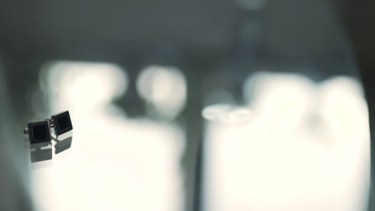 Close-Up Cufflinks on White Shirt