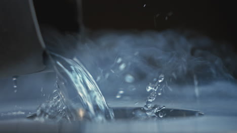 water pouring on dry ice