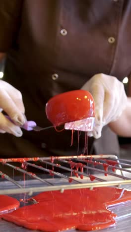 chef glazing a cake