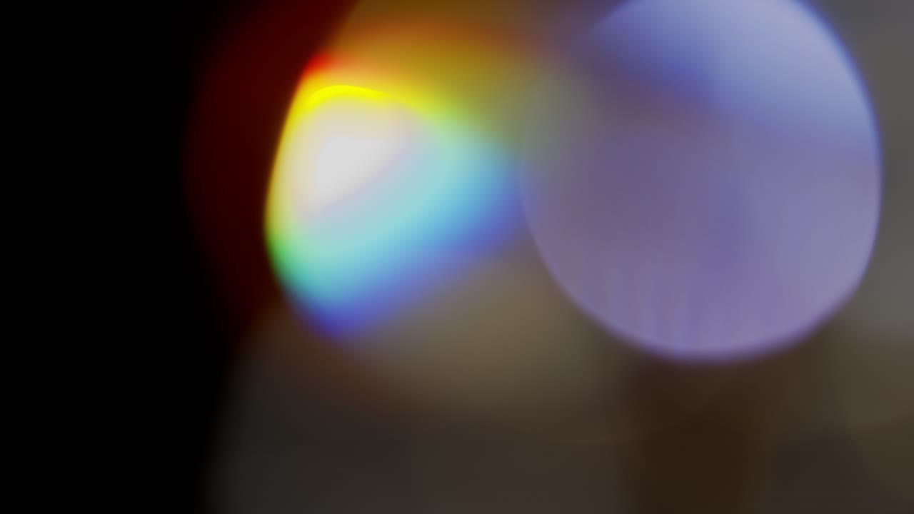 Multicolored light leaks 4k footage on black background, Stylizing video, transitions, Bokeh effect