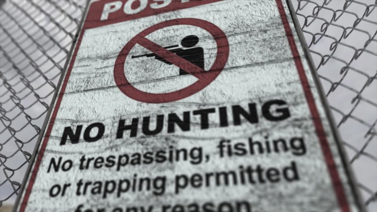 높은 품질의 3d cgi 렌더링과 함께 사막의 높은 보안 시설에서 체인링크 울타리의 근접 도 촬영, 사냥 금지, 침입 금지 표지판