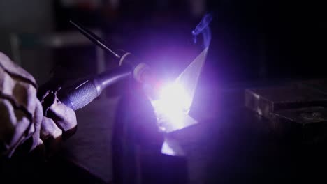 welder welding a metal