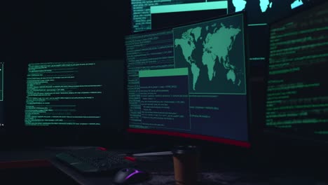 code on multiple computer screens, cyber attack
