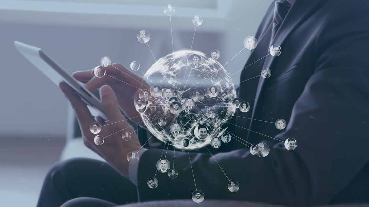 Animation of globe of profile icons over caucasian businessman using digital tablet at office