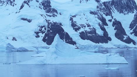 icebergs and snow-covered mountains in antarctica