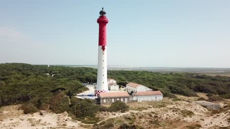 Lighthouse-between-forest-and-beach