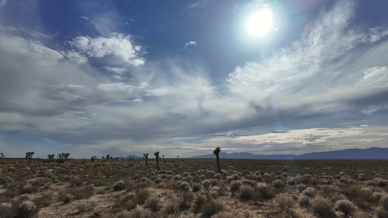 Time-Lapse of Clouds Over Mojave Desert Landscape, This footage is ideal for projects related to nature, travel