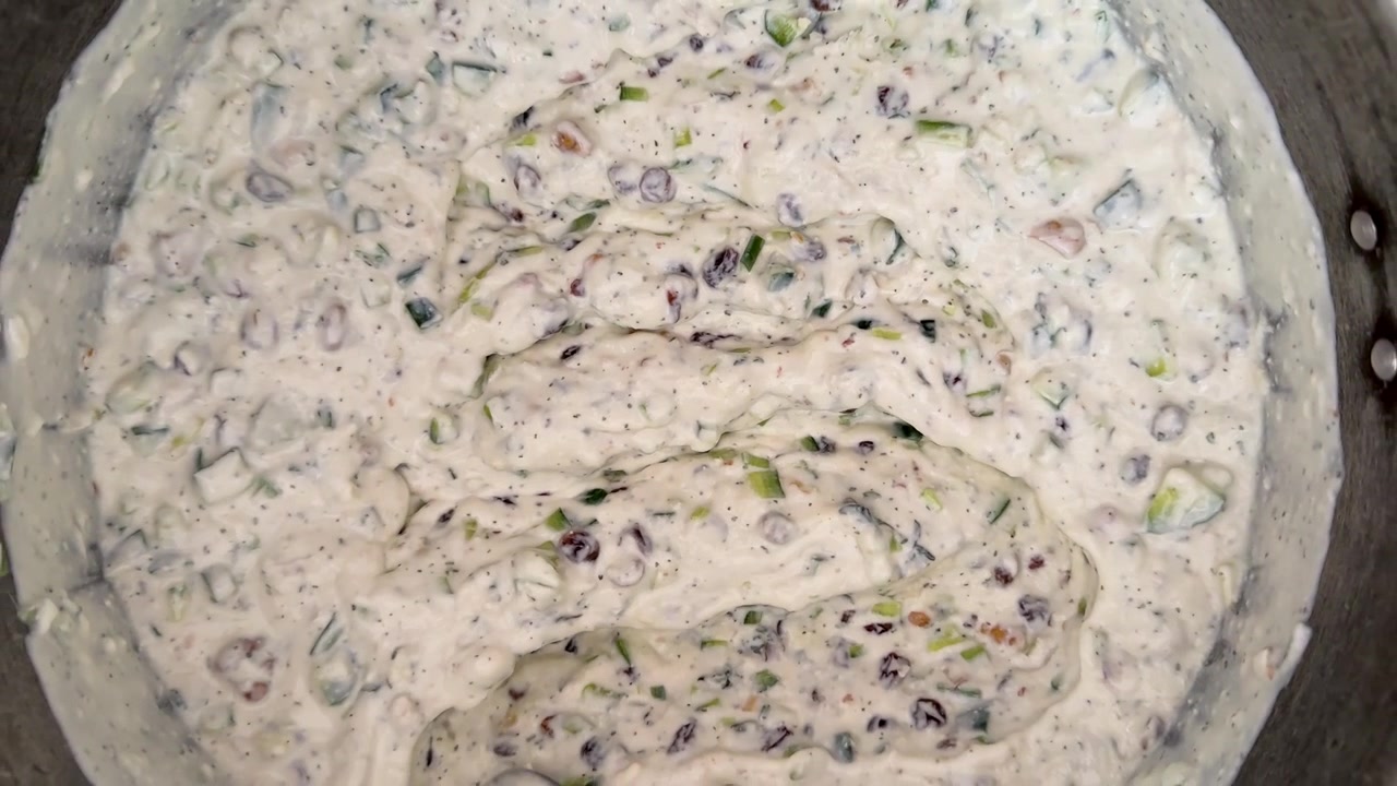 Persian yogurt creamy dip with mushroom and herbal sauce in the bowl for traditional Iranian cuisine with organic homemade party side dish textured swirl recipe food Iranian recipe delicious dipping