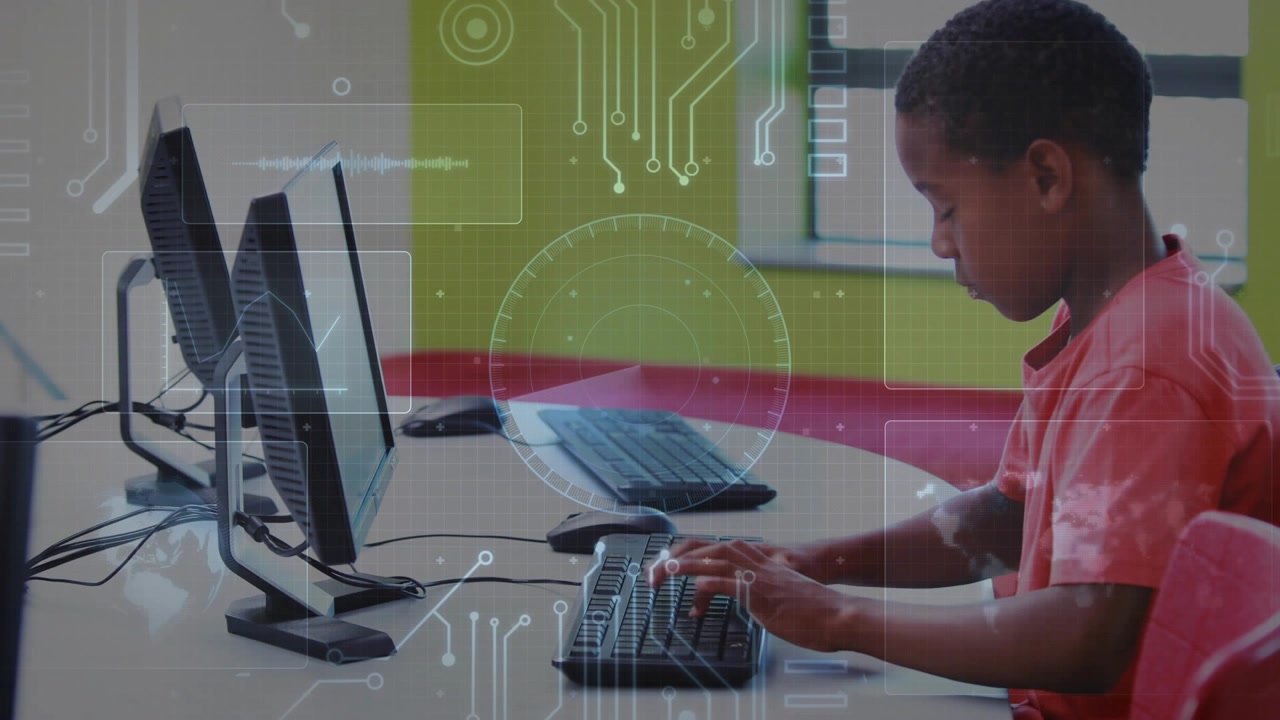 Boy entering school lab, touching keyboard and activating HUD overlays on monitors for coding