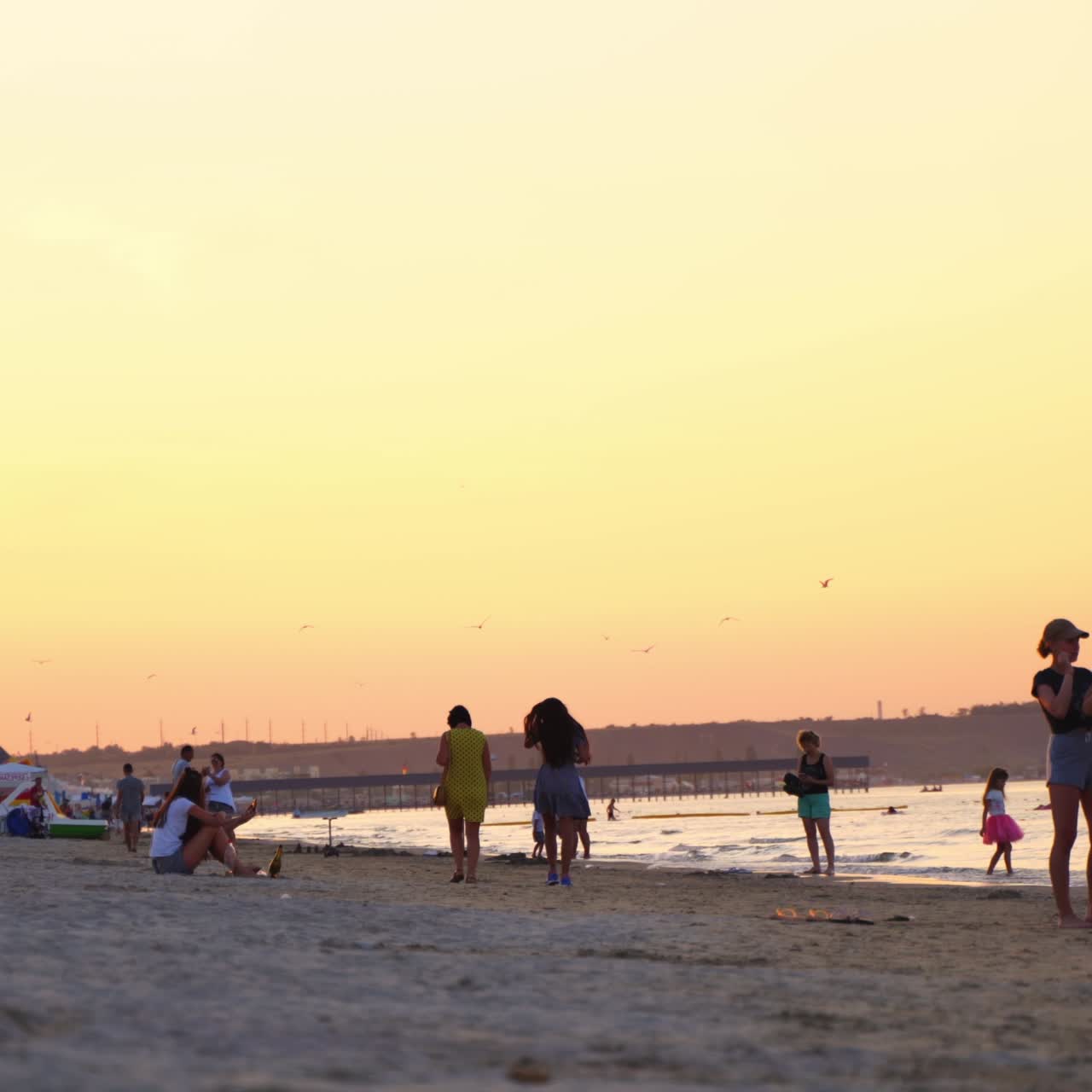 People relaxing on public beach
