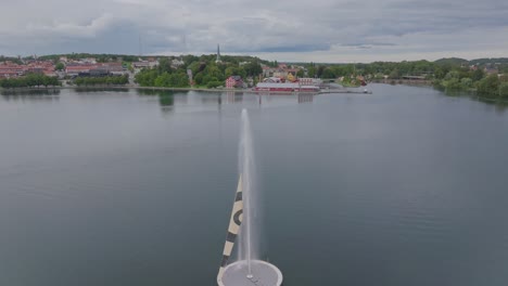 beautiful fountain in the ocean bay of scandinavian city motala in sweden