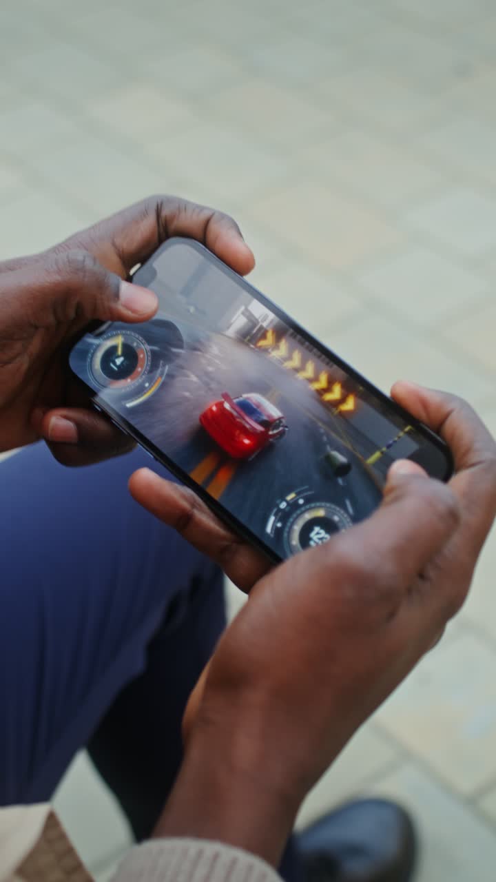 Playing Car Racing Mobile Game