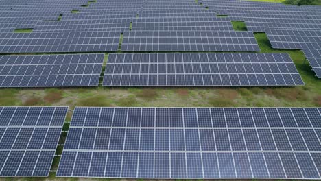 Aerial-trucking-shot-of-the-solar-panels-in-the-photovoltaic-power-plant