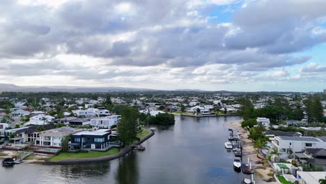 scenic aerial view of waterfront homes and pontoons