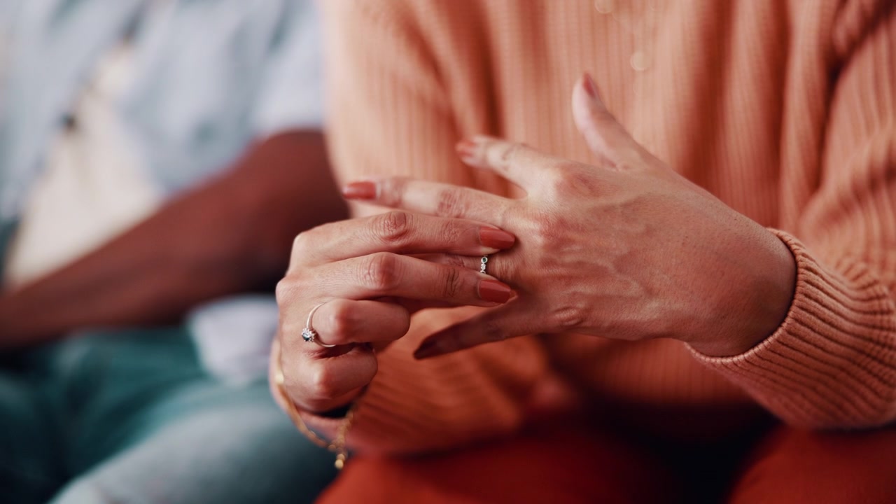 Close-up of Woman Playing with Her Wedding Ring