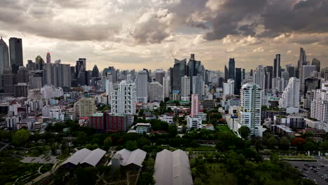 Impressive Bangkok city skyline view at sunset with vivid cloudscape, aerial