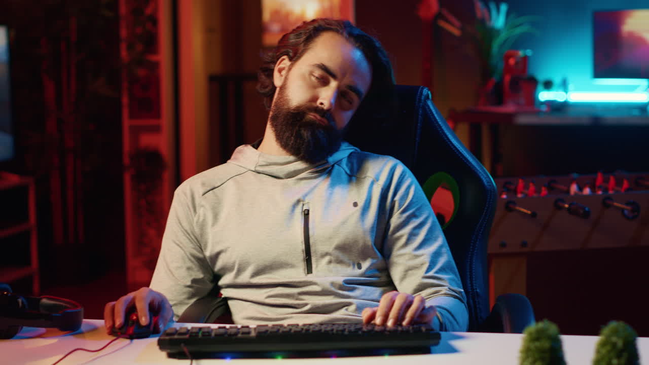 Sleepy man exhausted from playing too many videogames