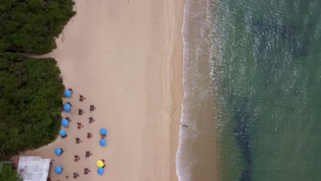 Peaceful-scene-of-green-sea-waves-on-beach-sand