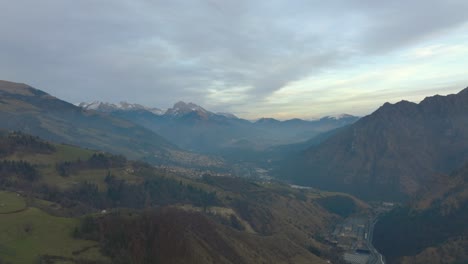 Beautiful-aerial-view-of-the-Seriana-valley-and-its-mountains-at-sunrise,-Orobie-Alps,-Bergamo,-Italy