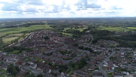 Left-to-right-aerial-shot-of-town-near-Wrexham,-Wales