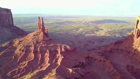 Beautiful-inspiring-aerial-at-sunset-over-rock-formations-in-Monument-Valley-Utah-3