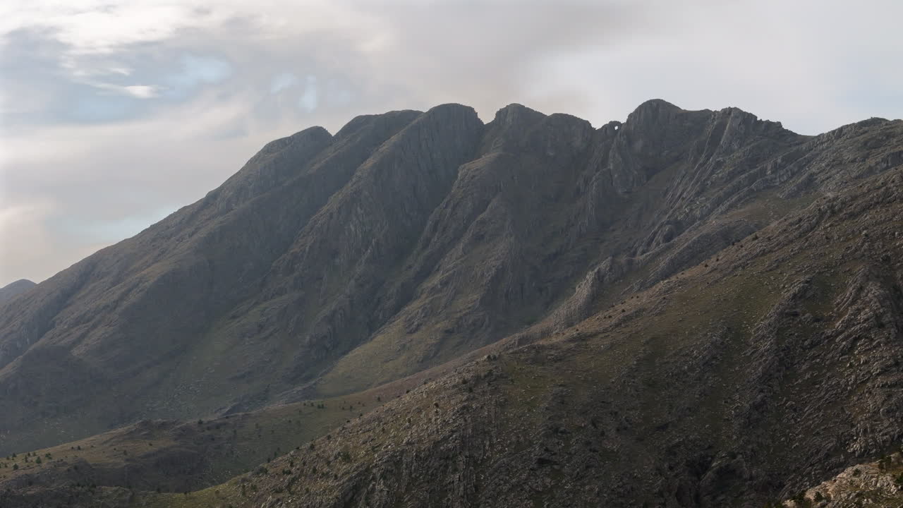 Drone panning shot of the Sierra de la Ventana mountain range in Buenos Aires province, Argentina, featuring its unique rock formations