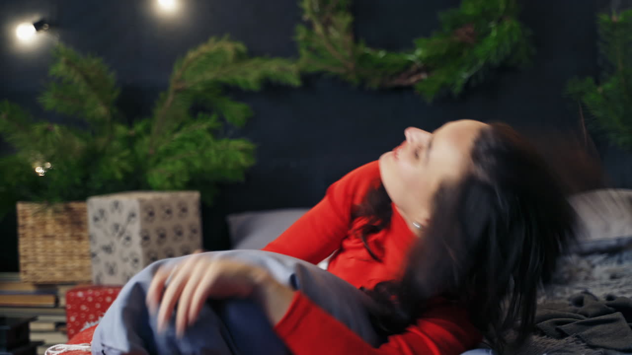 Beautiful smiling woman model. Fashion portrait of model girl indoors with Christmas decorations