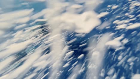 a humpback whale mother and calf swimming under the deep blue sea - underwater slow motion