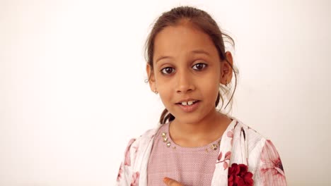 portrait of an indian child at home during coronavirus lockdown