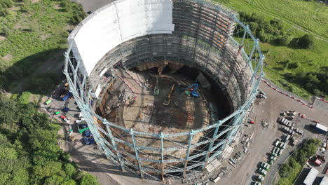 4k aerial of granton gasholder under construction, edinburgh, the capital of scotland, united kingdom