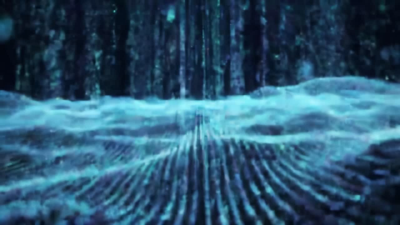 A mesmerizing visual display of flowing digital waves, illuminated by shimmering blue light, creating a captivating underwater-like experience of motion and depth.
