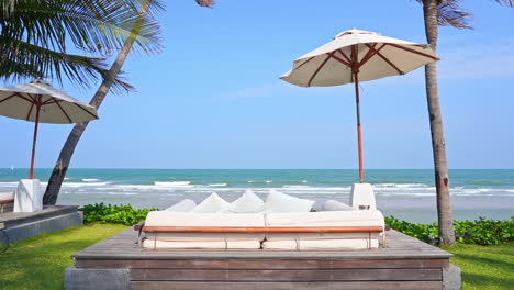 a comfortable conversation pit faces the incoming ocean