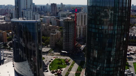 aerial view of modern city with construction site