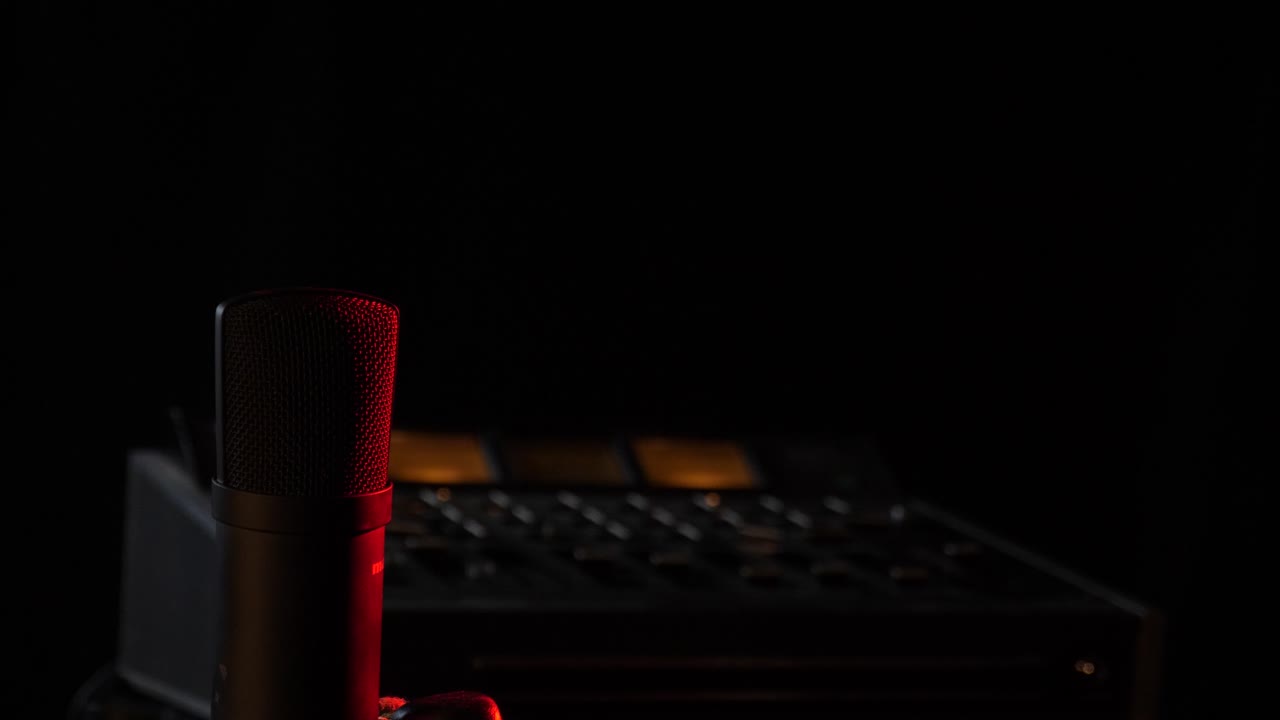 Microphone in the studio on the air with a mixing board