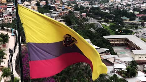 ecuadorian flag in slow motion from the lighthouse in the neighborhood of las peñas in guayaquil