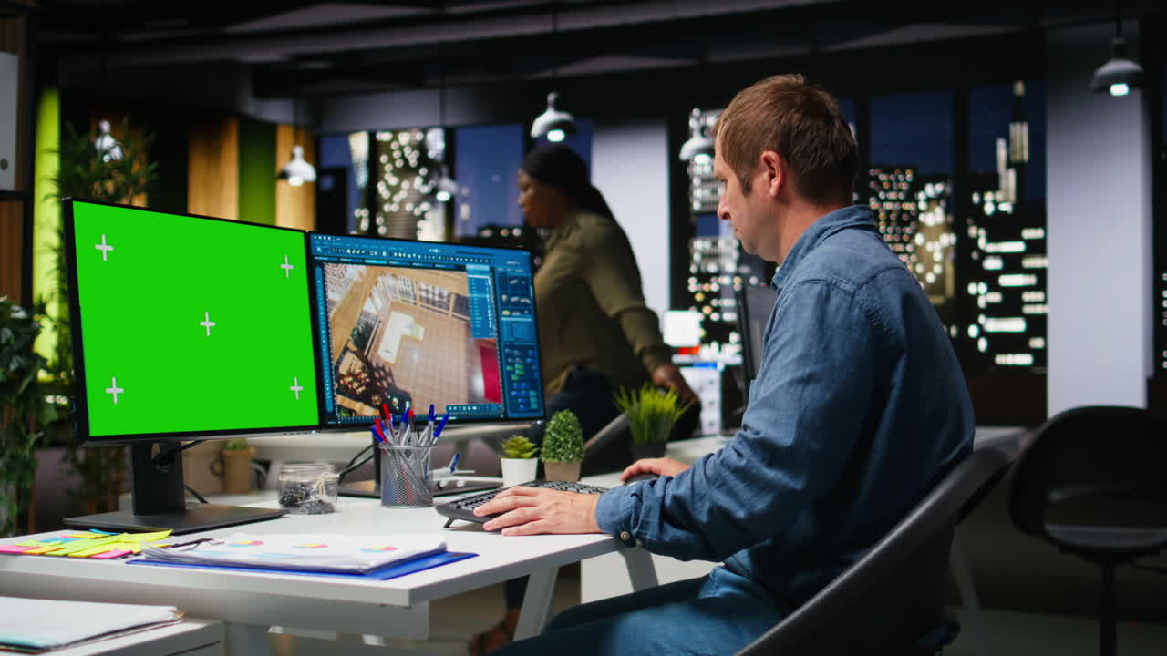 Green screen and CAD software used by IT engineer architect