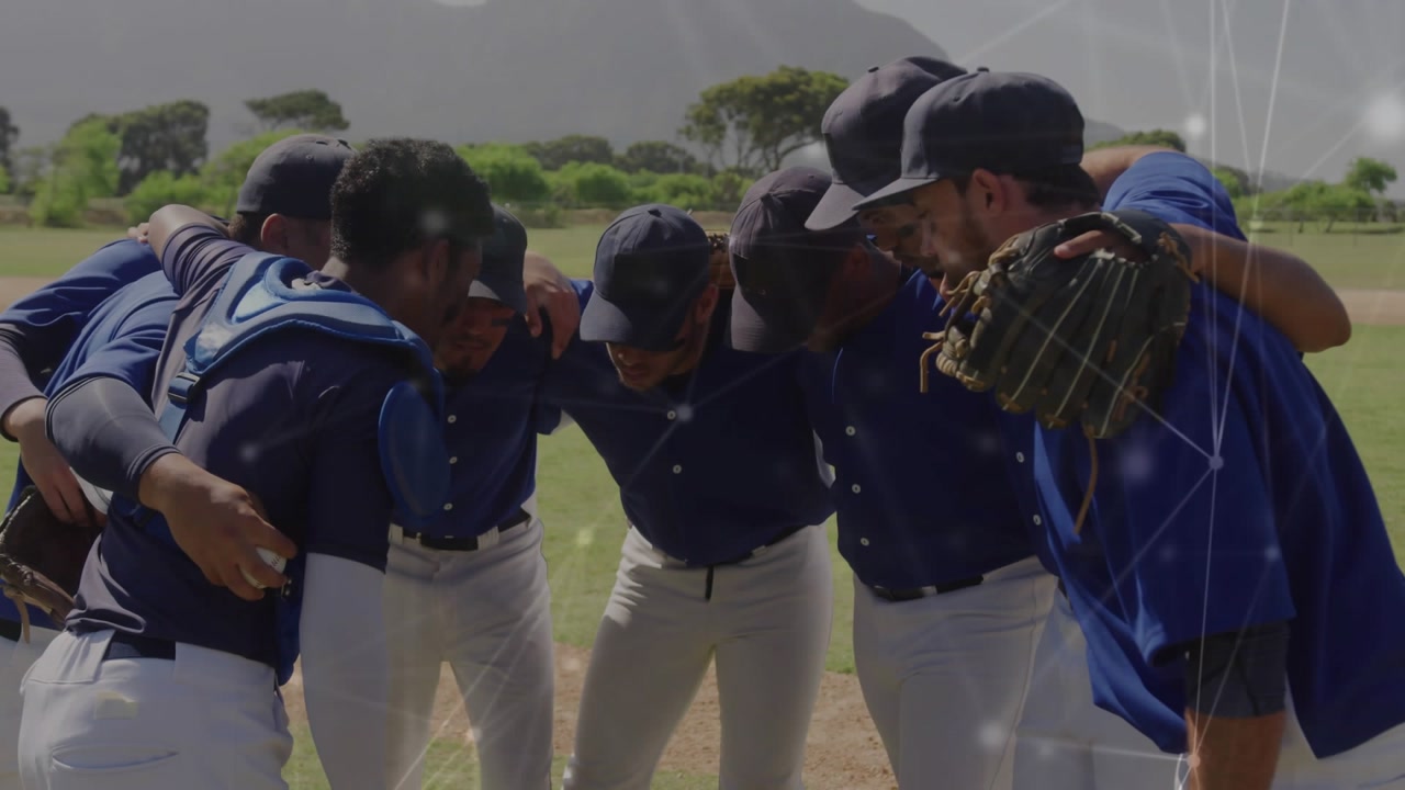 Eight baseball players forming huddle for unity before game with digital overlay intensifying