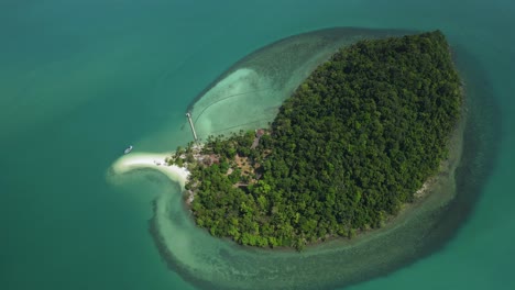 Aerial-ascending-drone-shot-tropical-island-with-white-sand-beach