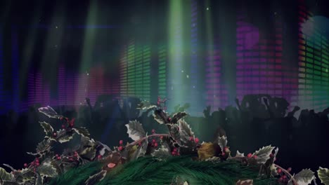 animation of christmas wreath and spotlights over dancing crowd with flashing wall of lights