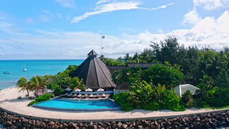 Aerial-drone-view-of-Denis-Private-Island-in-the-Seychelles,-Indian-Ocean