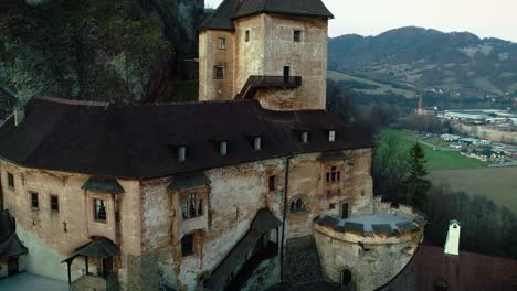 orava castle in slovakia strategically built into rocky hilltop, vantage point