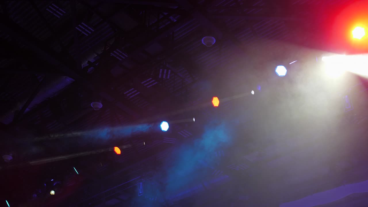 Multicolored spotlight of scene lights in the dark