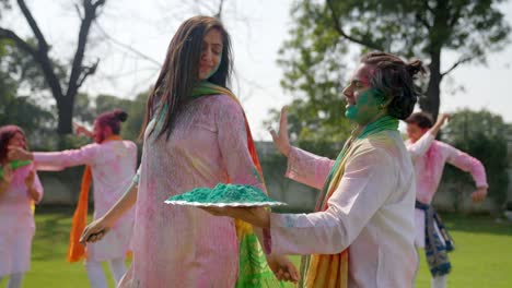 Indian-couple-enjoying-at-a-Holi-party